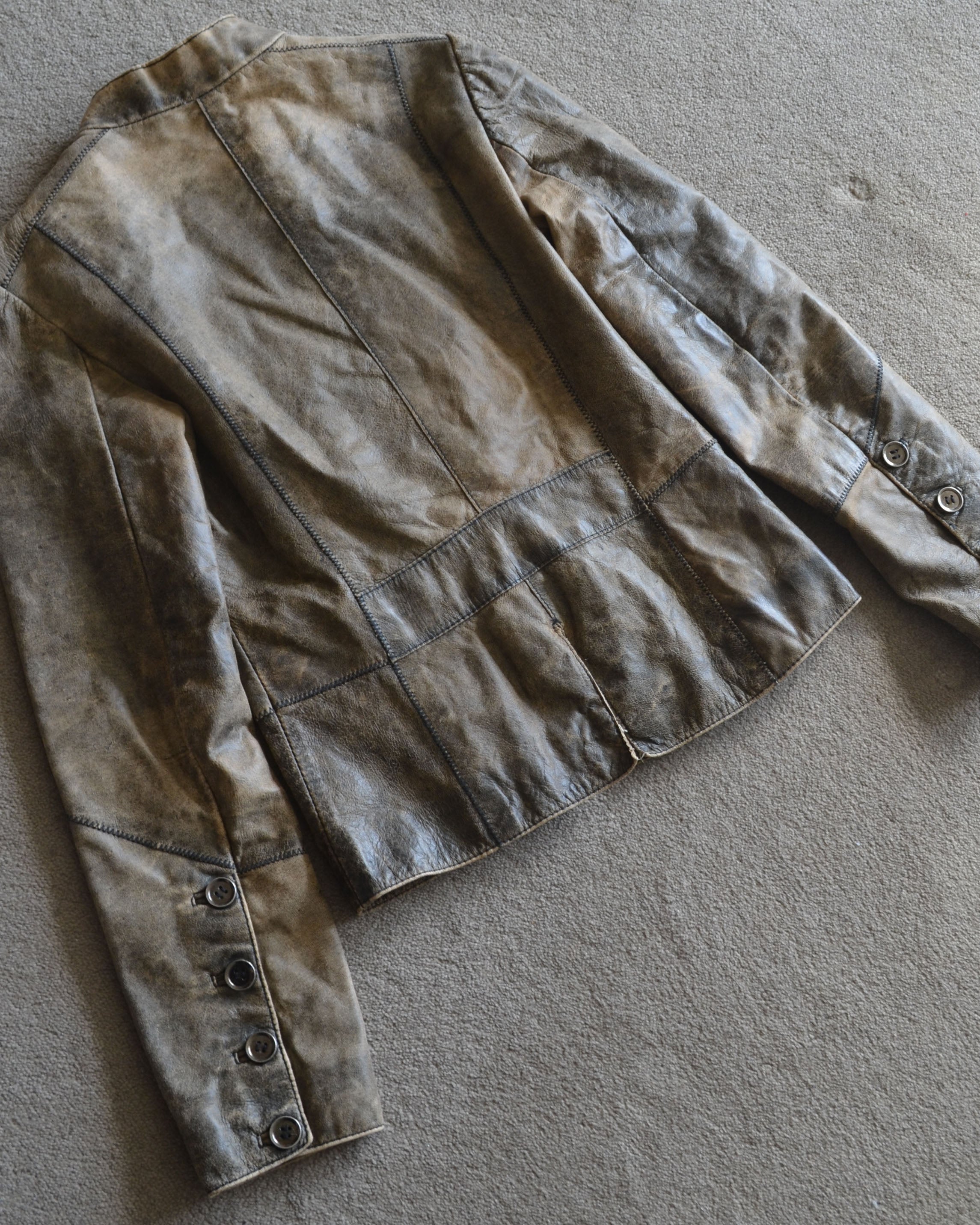 ASYMMETRICAL DISTRESSED LEATHER JACKET